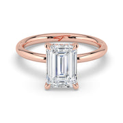 The Celeste Ring – Emerald Solitaire with Hidden Halo – The Jewel Concierge