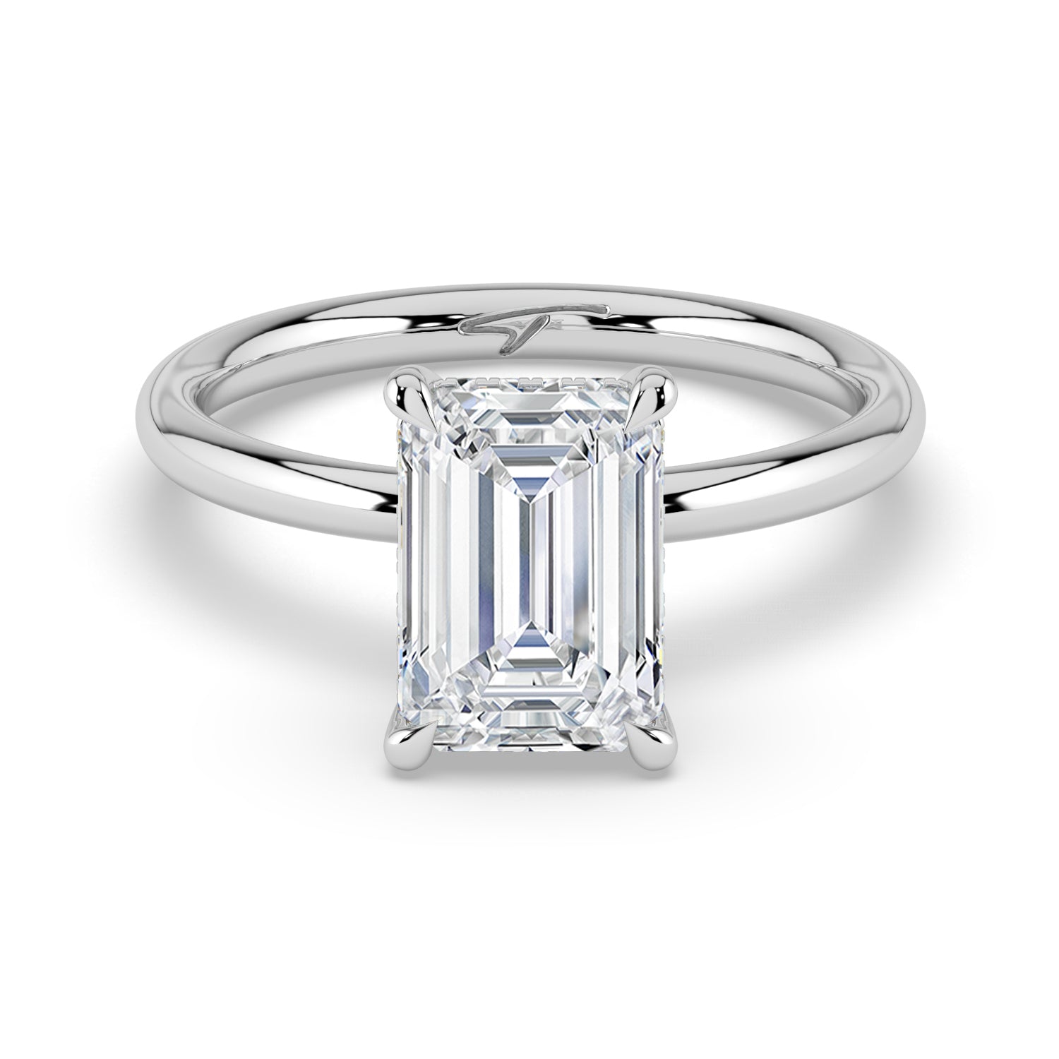 The Celeste Ring - Emerald Solitaire with Hidden Halo
