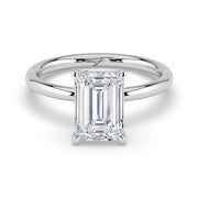 The Celeste Ring – Emerald Solitaire with Hidden Halo – The Jewel Concierge