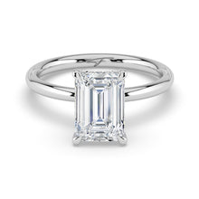 The Celeste Ring - Emerald Solitaire with Hidden Halo