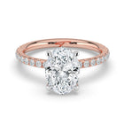 The Phoenix Ring - Oval Solitaire with Hidden Halo & Pavé Band