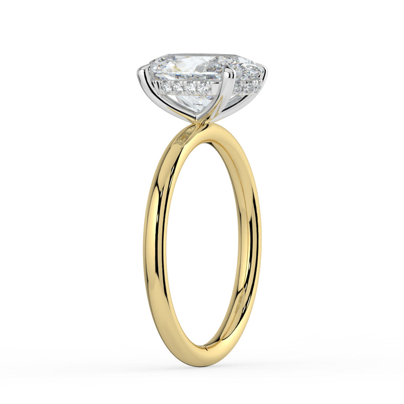 The Celeste Ring – Oval Solitaire with Hidden Halo in 18K White Gold and Yellow Gold – The Jewel Concierge