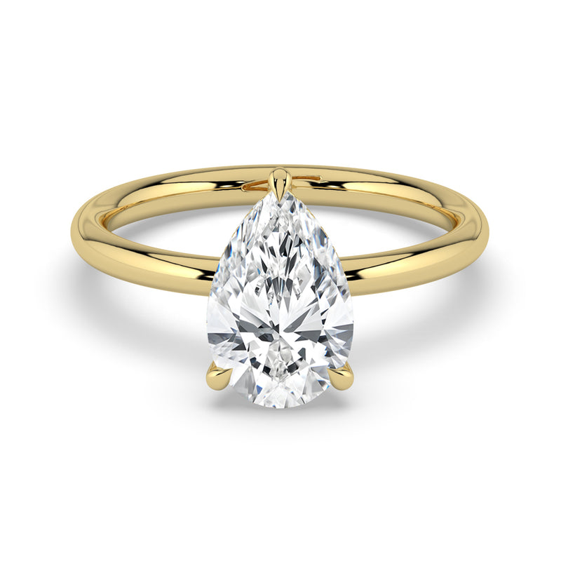 The Celeste Ring – Pear Solitaire with Hidden Halo in 14K Yellow Gold – The Jewel Concierge