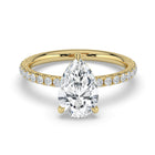 The Phoenix Ring - Pear Solitaire with Hidden Halo & Pavé Band