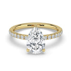The Phoenix Ring — Pear Solitaire with Hidden Halo & Pavé Band Lab-Grown Diamond Engagement Ring in Yellow Gold | The Jewel Concierge