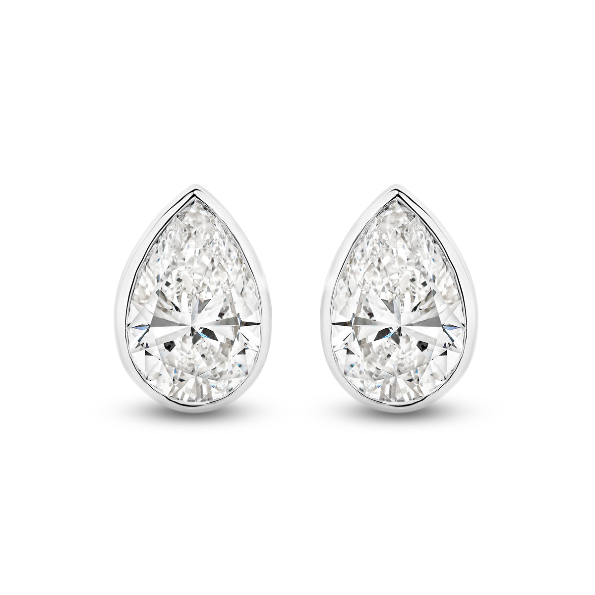 The Aurelia Earrings - Pear Bezel Studs
