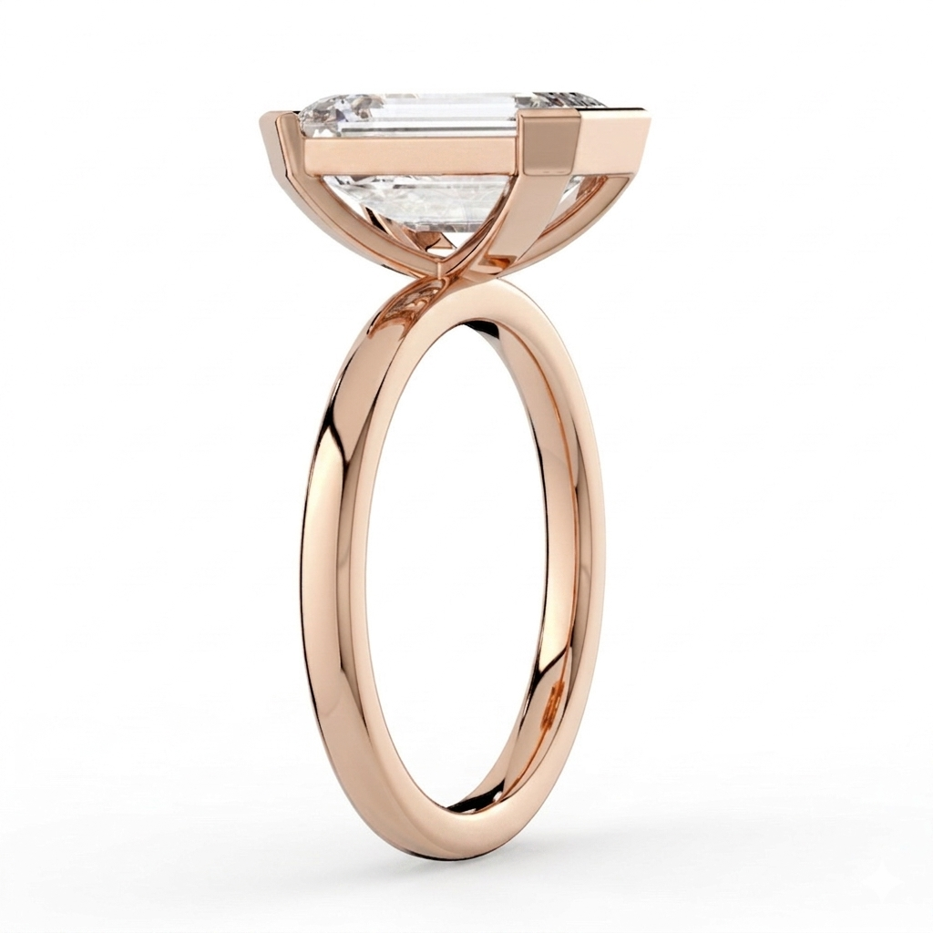 The Celine Ring – Oval Half Bezel Solitaire in 18K Rose Gold – The Jewel Concierge