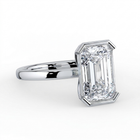 The Celine Ring – Oval Half Bezel Solitaire in 18K White Gold – The Jewel Concierge