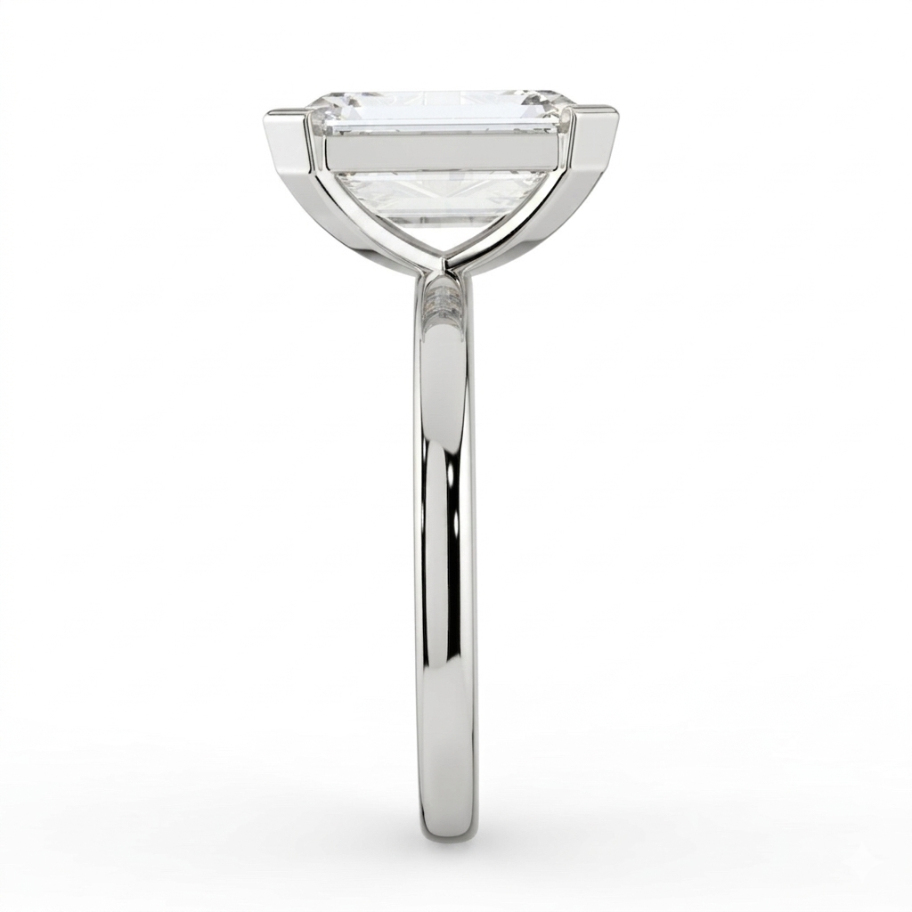 The Celine Ring – Oval Half Bezel Solitaire in 18K White Gold – The Jewel Concierge