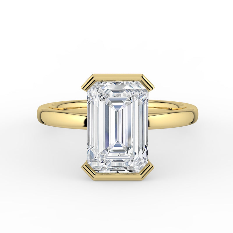 The Celine Ring – Emerald Half Bezel Solitaire in 18K Yellow Gold – The Jewel Concierge