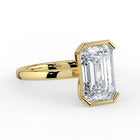 The Celine Ring – Oval Half Bezel Solitaire in 18K Yellow Gold – The Jewel Concierge