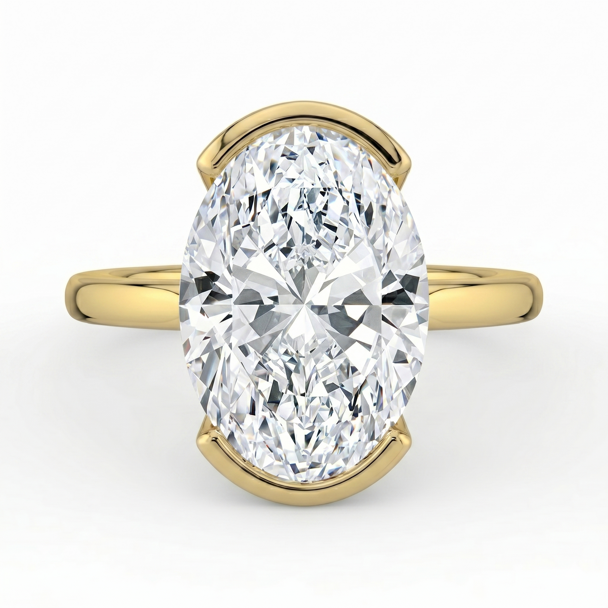The Celine Ring – Oval Half Bezel Solitaire in 18K Yellow Gold – The Jewel Concierge