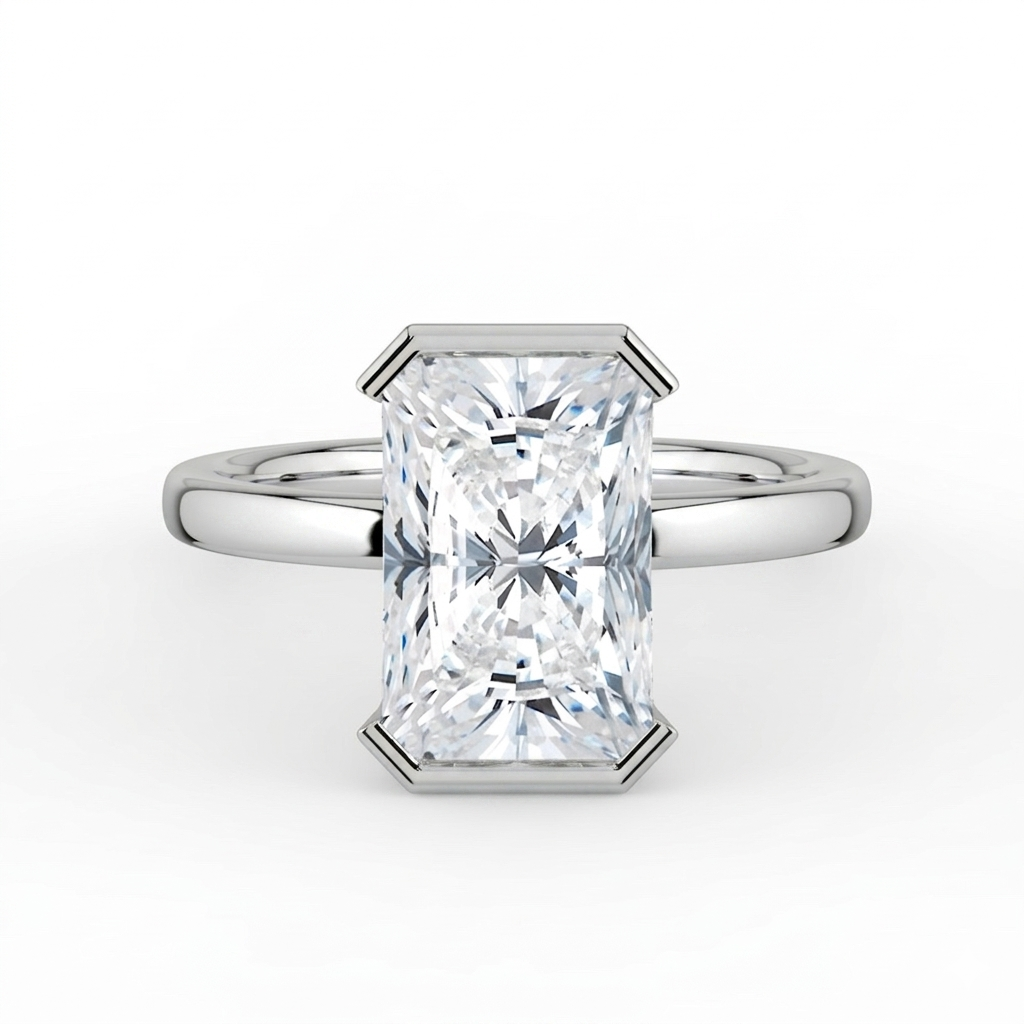The Celine Ring – Oval Half Bezel Solitaire in 18K White Gold – The Jewel Concierge