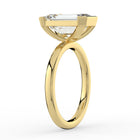 The Celine Ring – Oval Half Bezel Solitaire in 18K Yellow Gold – The Jewel Concierge