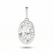 The Odette Pendant - oval-cut lab-grown diamond pendant in a bezel setting shown against a plain white background - The Jewel Concierge