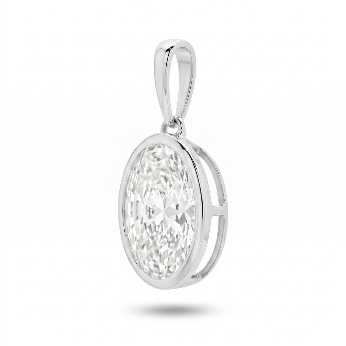 The Odette Oval Bezel Pendant - oval-cut lab-grown diamond pendant in a bezel setting shown against a plain white background - The Jewel Concierge