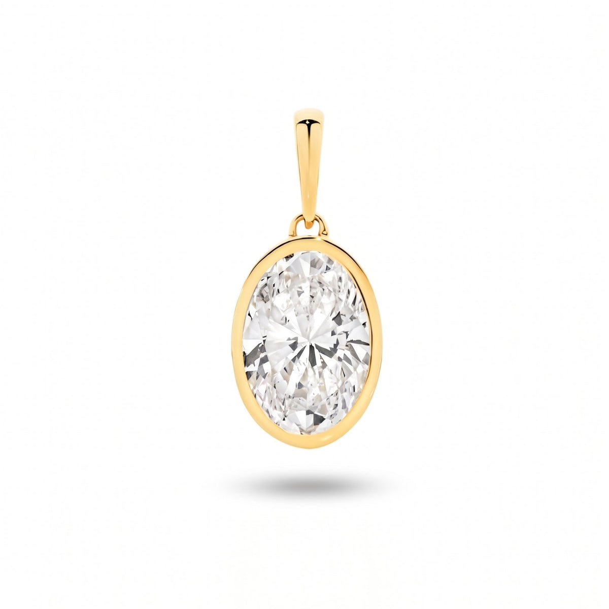 The Odette Oval Bezel Pendant - oval-cut lab-grown diamond pendant in a bezel setting shown against a plain white background - The Jewel Concierge