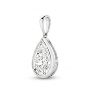 The Odette Pear Bezel Pendant - pear-cut lab-grown diamond pendant in a bezel setting shown against a plain white background - The Jewel Concierge