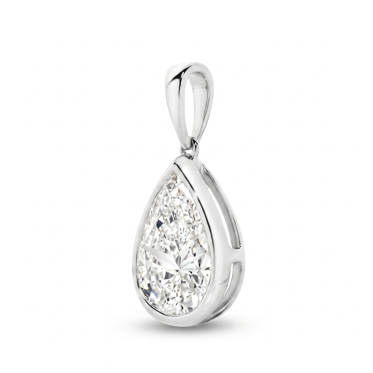 The Odette Pear Bezel Pendant - pear-cut lab-grown diamond pendant in a bezel setting shown against a plain white background - The Jewel Concierge