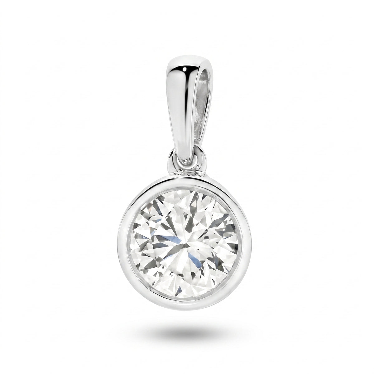 The Odette Round Bezel Pendant - Round-cut lab-grown diamond pendant in a bezel setting shown against a plain white background - The Jewel Concierge
