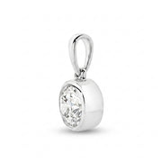 The Odette Round Bezel Pendant - Round-cut lab-grown diamond pendant in a bezel setting shown against a plain white background - The Jewel Concierge