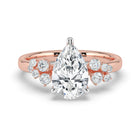 The Aurora Ring - Pear with Round Brilliant Accents