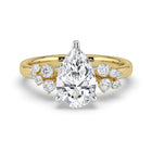 The Aurora Ring - Pear with Round Brilliant Accents