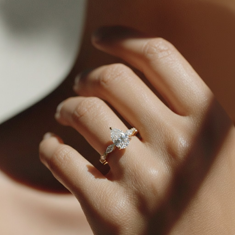 The Vega Ring – Pear with Marquise & Round Accents in 14K White Gold – The Jewel Concierge
