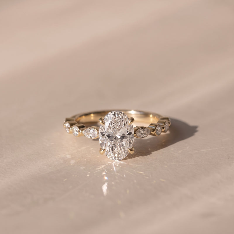 The Vega Ring — Oval with Marquise & Round Accents Lab-Grown Diamond Engagement Ring in Yellow Gold | The Jewel Concierge