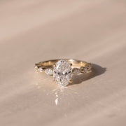 The Vega Ring — Oval with Marquise & Round Accents Lab-Grown Diamond Engagement Ring in Yellow Gold | The Jewel Concierge