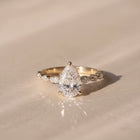 The Vega Ring — Pear with Marquise & Round Accents Lab-Grown Diamond Engagement Ring in Yellow Gold | The Jewel Concierge