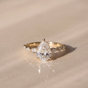 The Vega Ring — Pear with Marquise & Round Accents Lab-Grown Diamond Engagement Ring in Yellow Gold | The Jewel Concierge