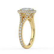 The Elara Ring – Elongated Cushion Orbital Halo with Split Pavé Band in 18K Yellow Gold – The Jewel Concierge