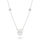 A white gold necklace featuring a delicate chain with five small round bezel-set lab-grown diamonds spaced along the chain, ending with an oval-cut lab-grown diamond solitaire pendant, shown on a white background - The Jewel Concierge