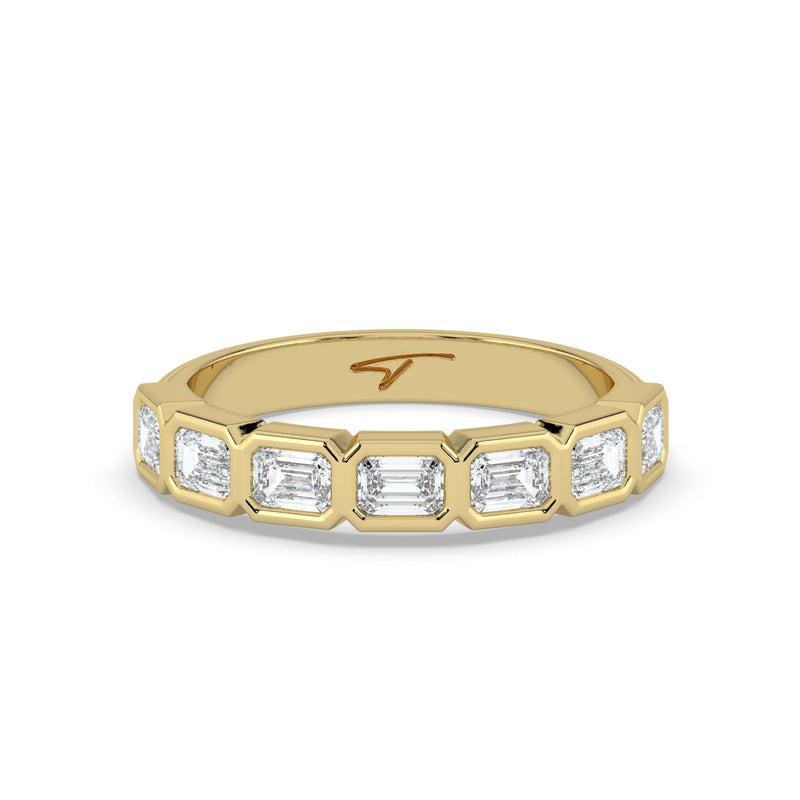 The Sara Ring - East West Emerald Bezel Set Half Eternity Band
