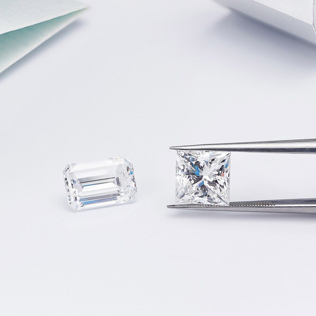 emerald and radiant lab-grown diamonds on a white background